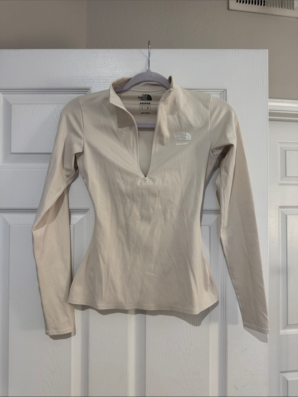 Skims x The North Face long sleeve half zip
